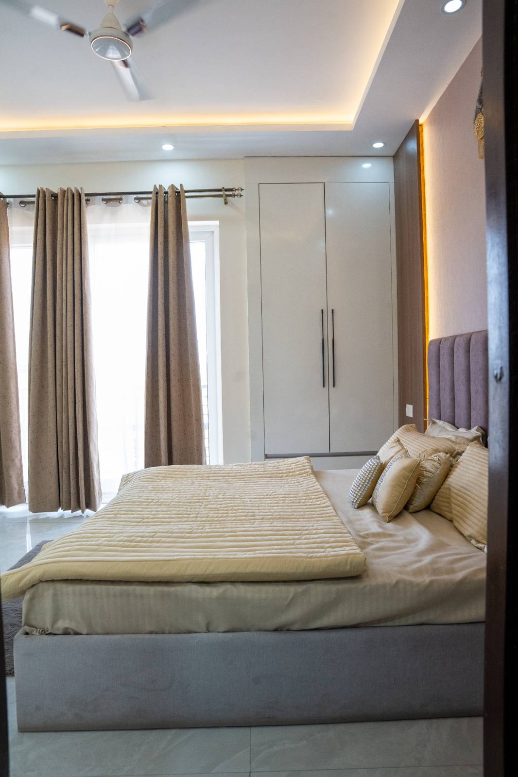 2 BHK bedroom with wardrobe wall